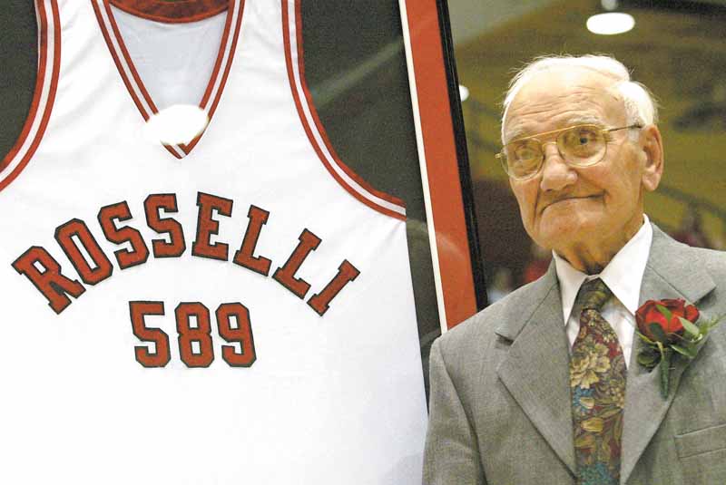 Don Rosselli is honored with a jersey in his name during a ceremony at halftime at Beeghly Stadium marking his years as a YSU basketball coach. The number589 on the jersey denotes the number of wins YSU had under the instruction of Rosselli (Vindicator/Mark W. Lipczynski).