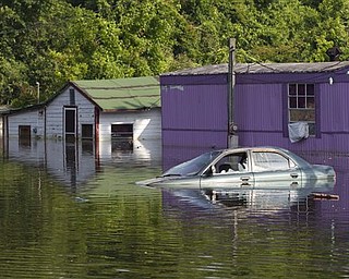 Floodwaters from the Mississippi River are slowly starting to recede in Vicksburg, Miss., Sunday, May 22,  2011 and the slow withdrawal of water may keep residents out of their homes for weeks to come.