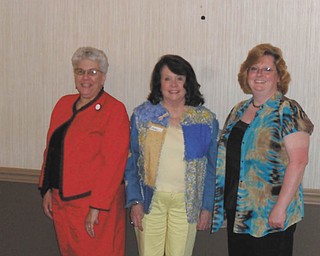 Winners of Best in Show awards during a Spring Extravaganza sponsored by the Niles Chapter of the American Sewing Guild are, from left, Gretchen Saunders, quilting; Patti Augustine, garment sewing; and Denise Cline for an afghan in the miscellaneous category. 