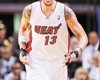 Miami Heat's Mike Miller reacts after the Heat loses possession of the ball during the first half of Game 4 of the NBA Eastern Conference finals basketball series against the Chicago Bulls in Miami, Tuesday, May 24, 2011. 