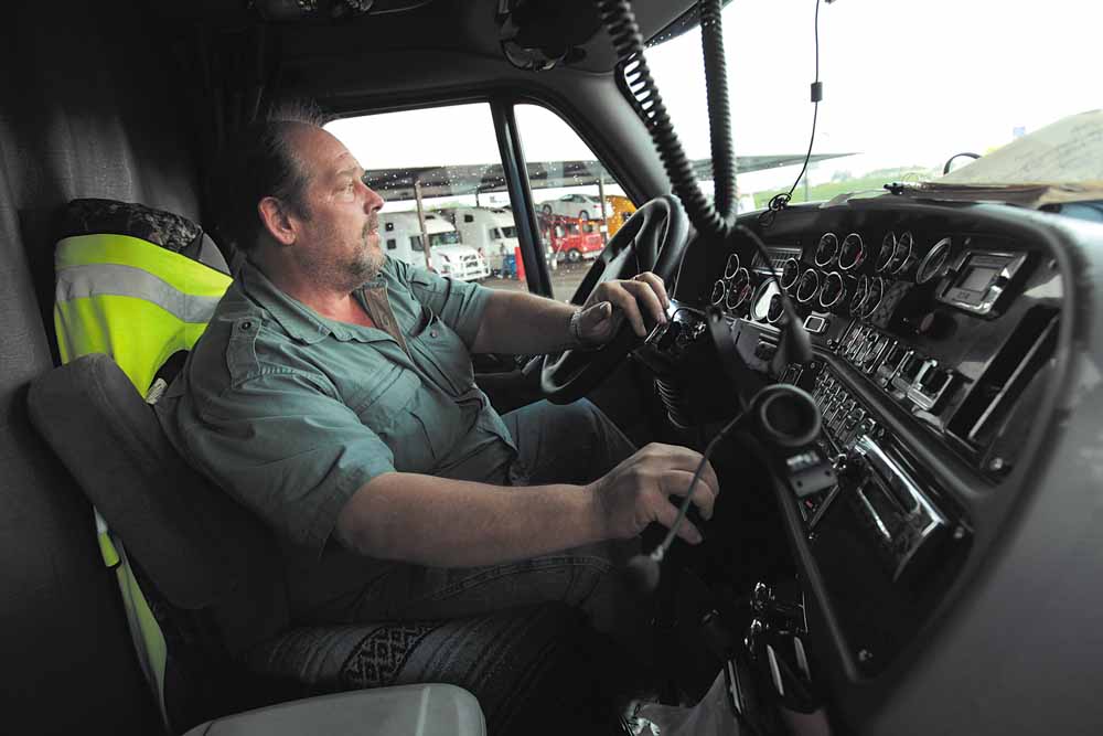 Glenn Horack parks his rig at a truck stop off Interstate 80 in Gary, Indiana, May 11, 2011. Like many truckers, Glenn put on a lot of weight over the years due to his sedentary job, the long hours required, and the quality of food available to him at truck stops. His wife, Karla, keeps him honest and a slow cooker. Horack, who has dropped 100 pounds in the last year, still has plenty of roadblocks.