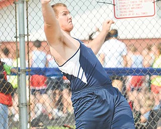 Austintown Fitch sophomore Billy Price throws during the discus finals at the Division I regional championship meet at Falcon Stadium. Price advanced to the state meet with a second-place finish. 
