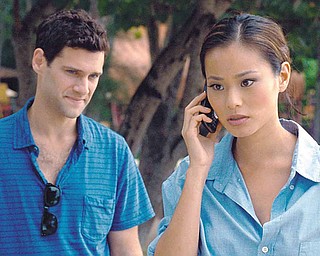 Justin Bartha as Doug and Jamie Chung as Lauren in Warner Bros. Pictures and Legendary Pictures comedy THE HANGOVER PART II, a Warner Bros. Pictures release.