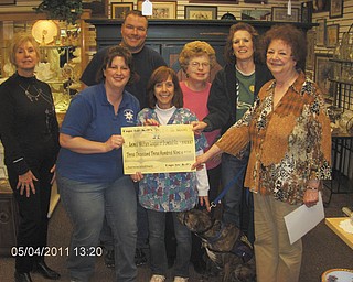For the love of dogs: Cops for K9s presented a check May 4 for more than $3300 to the Animal Welfare League of Trumbull County. The money was raised at an annual garage sale. Pictured are volunteer Shirley Walters of Creative Talents 4-H Club, organizers Melissa and Chris Herlinger, shelter Director Debbie Agostinelli, volunteer Shirley Hryonak, volunteer Joy Knapp, and shelter President Barb Busko. Donations for next year’s sale are being collected. Contact Cops for K9s at 330-883-1259 or email Copsfork9s@aol.com for more information.