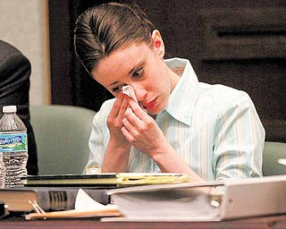 Casey Anthony reacts during her trial at the Orange County Courthouse, Thursday, May 26, 2011, in Orlando, Fla. Anthony is charged with murder in the 2008 death of her daughter Caylee. (AP Photo/Red Huber, Pool)