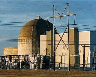 FILE - This Jan. 11, 2000, file photo shows the Wolf Creek Nuclear power plant near New Strawn, Kan., which went online in 1985. The Wolf Creek plant, the closest nuclear power plant to the tornado-ravaged city of Joplin, Mo., was singled out weeks before the deadly storm for being vulnerable to twisters. Inspections triggered by the Japan nuclear crisis found that some emergency equipment and storage sites at the plant in southeastern Kansas might not survive a tornado. (AP Photo/Capital Journal, David Eulitt, File)