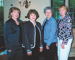 Members of the Youngstown Area Federation of Women’s Clubs met recently for a scholarship luncheon at the Youngstown Country Club. From left to right are Barbara Higgins, second vice president; Valorie Zurawick, Woman of the Year; Atty. Evelyn Bachman, Ohio Federation of Women’s Clubs president; and Rusti Puromaki, first vice president. Not pictured are Debra Kostelic, federation president, and YSU student Megan Harwell, who received a $2,500 scholarship during the luncheon.