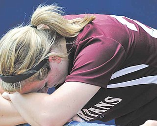 Boardman's Brooke Meenachanreacts to watching North Canton Hoover celebrate after beating Boardman 3-0 to win the regional final.