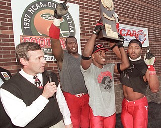 Jim Tressel and his player during the trophy presentation following their Div I-AA National Championship win over McNeese State in 1997.