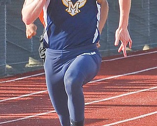 Miles Dunlap of Mcdonald wins the boys 100 Meter competition at the ITCL Tier 2 track meet held at Western Reserve High School.