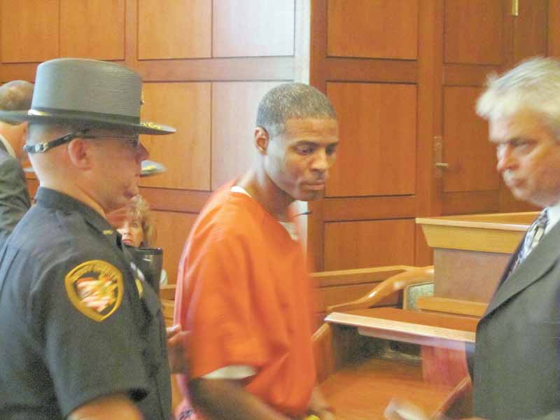 Frederick D. Johnson is led from the courtroom after Judge Peter Kontos of Trumbull County Common Pleas Court sentenced Johnson to 32 years in prison for being a “major  drug offender.”