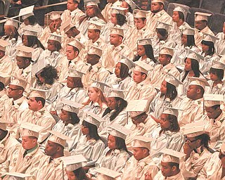 The roughly 200 members of the East High School Class of 2011 are the first class to spend all four years at the new East, starting as freshmen in 2007, the first year the new building opened. They awaited their turn Thursday morning to walk across the Stambaugh Auditorium stage and receive diplomas.