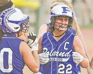 Poland’s Erin Gabriel (22) not only pitched but helped to hit the Bulldogs to a 14-2 win over the Tippecanoe Red Devils in the Division II state softball semifinal game Thursday at Akron Firestone Stadium. Gabriel matched teammate Jenna Modic with two doubles and a homer, except Gabriel’s three-run shot in the second
inning was part of a five RBIgame. Poland faces LaGrange Keystone on Saturday in the state title game.