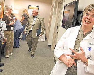 Health Partners Family Nurse Practicioner Jana Dahn, right, spoke with Anoka County employees during an open house for the new medical clinic inside the Anoka County Courthouse in Anoka, Minnesota, Tuesday, May 10, 2011. The clinic will be staffed by either a physician assisant or nurse practicioner. (Bruce Bisping/Minneapolis Star Tribune/MCT)