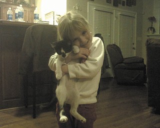 The kitty's name is Chet, and he is 7 months old. Anthony and Beth Jones of Lumberton, N.C., adopted him on Christmas Eve 2010 for their daughter, Natalie (grandaughter of Gary and Ann Duracky of Poland).