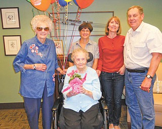 On hand to help Anna Kozmensky, center, celebrate her 103rd birthday on May 9 at Shepherd of the Valley-Niles were, from left, her sister, Fran Valcinic; her nieces, Kathy Bohach and Paula Terlecky; and her nephew, Jeff Terlecky.