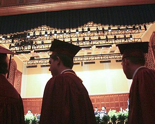 ROBERT K. YOSAY | THE VINDICATOR --..Graduates on their way for diplomas - Cardinal Mooney's 53 Annual Commencement at Stambaugh Auditorium . -30-..(AP Photo/The Vindicator, Robert K. Yosay)