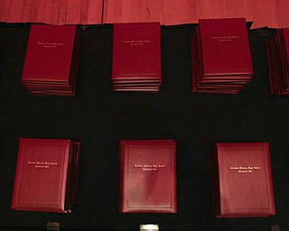 ROBERT K. YOSAY | THE VINDICATOR --..Diplomas are ready as Cardinal Mooney's 53 Annual Commencement at Stambaugh Auditorium . -30-..(AP Photo/The Vindicator, Robert K. Yosay)