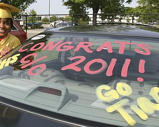 ROBERT K. YOSAY | THE VINDICATOR --..READY FOR LIFE - Tiara Williams cap gown and car.....Cardinal Mooney's 53 Annual Commencement at Stambaugh Auditorium . -30-..(AP Photo/The Vindicator, Robert K. Yosay)