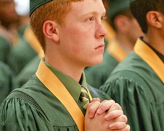 William d Lewis the Vindicator Ursulien grad William Wainio during Saturday commencement at Stambaugh Auditorium.