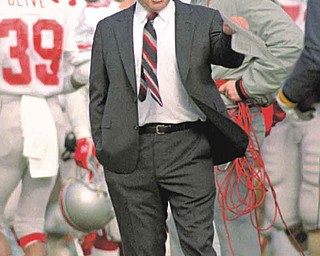 Ohio State Coach Earle Bruce patrols the sidelines during a game with Michigan in Ann Arbor, Mich., Nov. 21, 1987. Bruce was fired this week as head coach of the Buckeyes. (AP Photo/Robert Kozloff)