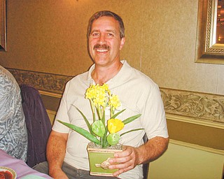 The gift of gardening: Phil Steiner, a radio talk-show host, gives gardening tips at a recent meeting of Trumbull Retired Teachers Association. The next meeting of the association will be at noon June 14 at Ciminero’s Banquet Centre, 123 N. Main St., Niles. Ten students from nine Trumbull County public schools will be introduced as the 2011 TRTA scholarship recipients. The scholarship committee was Joyce Faiver, Una Ford and Ruby Hawkins. Anyone interested in attending the meeting should make reservations by Sunday by sending $11 to Mary Novotny, 5799 Sarah Ave. NW, Warren, OH 44483. Checks are to be made payable to TRTA. The group is still accepting early registration for the TRTA Spelling Bee at the Trumbull County Fair. For bee registration call 330-530-4011.