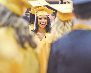 Warren G. Harding High School senior Mariah Brown waits along with her Class of 2011 classmates as they file into the high school gymnasium for commencement exercises Tuesday evening.
