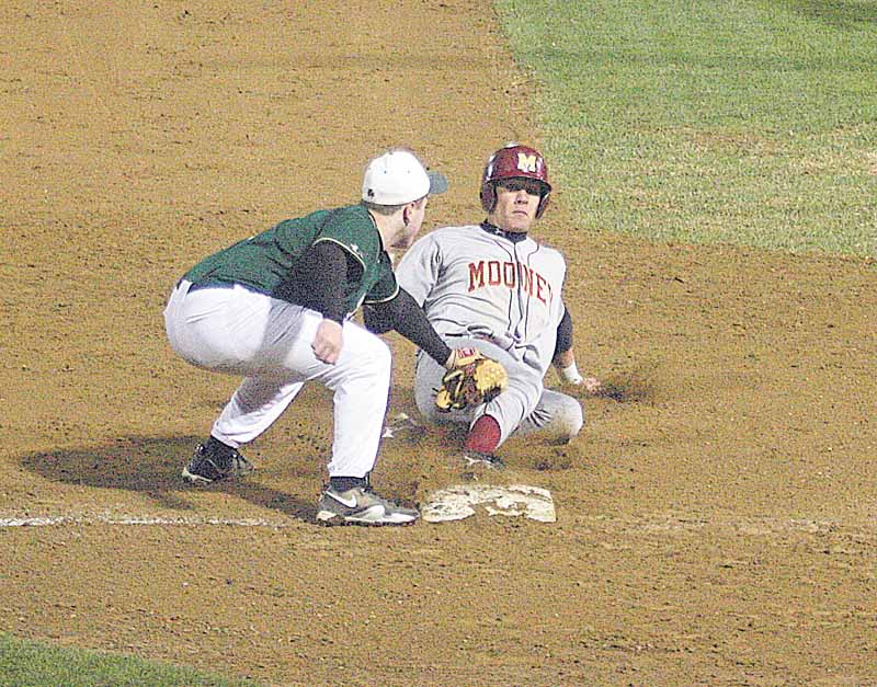 BASEBALL - (5) Harrison Finelli of Ursuline puts the tag on (21) Boo Vazquez during a recent game