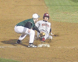 BASEBALL - (5) Harrison Finelli of Ursuline puts the tag on (21) Boo Vazquez during a recent game