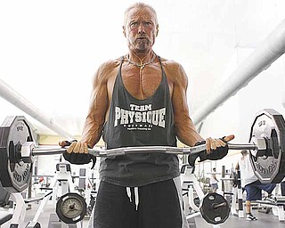 Ken Johnson from Waterloo, Illinois, works out at Bally Total Fitness, May 16, 2011, in Maryland Heights, Missouri. Johnson is an all-natural bodybuilder at age 60 who has not used steroids to alter his physique. (Johnny Andrews/St. Louis Post-Dispatch/MCT)