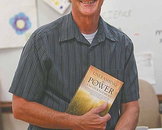 Poland Middle School teacher, softball coach and pastor Reid Lamport published a book on the power of encouragement, a philosophy he passes on to his students, family and everyone he meets.