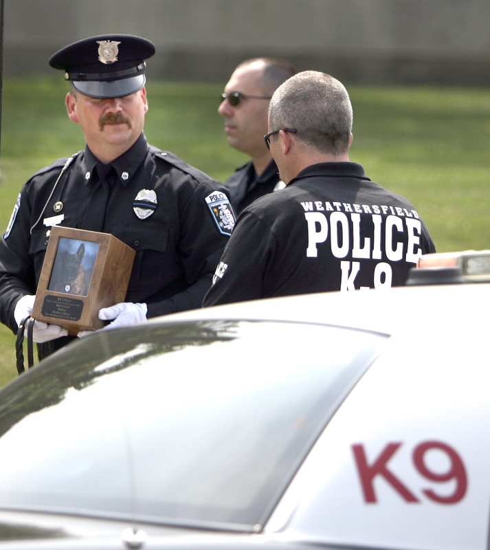 ROBERT K. YOSAY | THE VINDICATOR..Chico - New Castle Police K-9 Officer was honored today with a memorial service and  a memorial drive thru the city. Chico died Saturday after being left in a police car for almost three hours. The handler -officer- who has not been named is suspended without pay...-30-