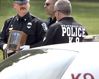 ROBERT K. YOSAY | THE VINDICATOR..Chico - New Castle Police K-9 Officer was honored today with a memorial service and  a memorial drive thru the city. Chico died Saturday after being left in a police car for almost three hours. The handler -officer- who has not been named is suspended without pay...-30-