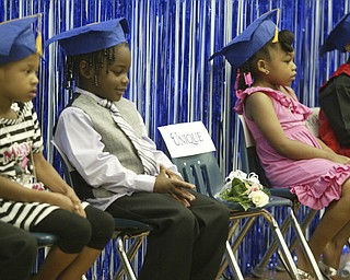 Unique Moore, a preschool student at Mill Creek Children's Center, died recently in a swimming accident. She was remembered during a graduation ceremony at the center.