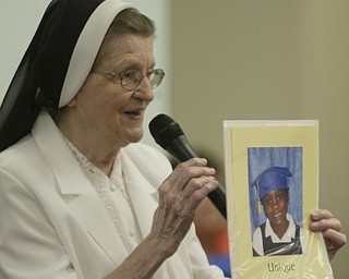 Unique Moore, a preschool student at Mill Creek Children's Center, died recently in a swimming accident. She was remembered during a graduation ceremony at the center.