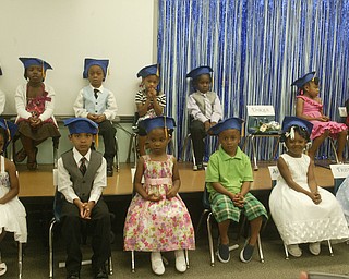 Unique Moore, a preschool student at Mill Creek Children's Center, died recently in a swimming accident. She was remembered during a graduation ceremony at the center.