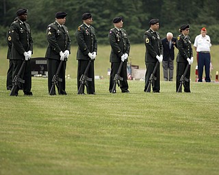 NEW CASTLE, PA - JUNE 11: The firing squad stands in silence while the precession enters the cemetary on June 11, 2011 in New Castle, PA. (photo by: Justin K. Aller)