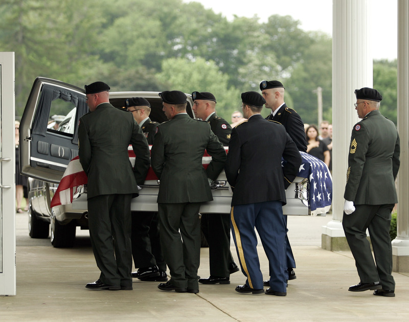 NEW CASTLE, PA - JUNE 11:  The honor guard carries the flag-draped casket of Staff Sgt. Edward Mills Jr. into the mausoleum on June 11, 2011 in New Castle, PA.  (photo by:  Justin K. Aller)