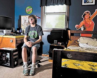 Despite the cerebral palsy that severely weakened his legs, Anthony Hartwig, 19, never lost his athletic drive. Using his canes, he’ll walk across the graduation stage today at South Range High School to receive his diploma.