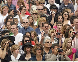 ROBERT K. YOSAY | THE VINDICATOR --..A packed crowd as parents family and friends watch as the 2011 class takes their seats - Canfield High School 2011 graduation at the Stadium - .. -30-..(AP Photo/The Vindicator, Robert K. Yosay)