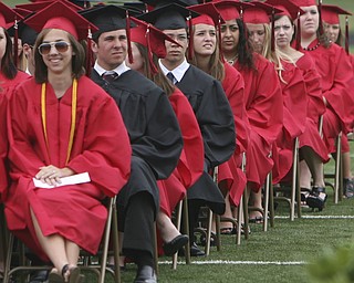 ROBERT K. YOSAY | THE VINDICATOR --..Rapt attention .. as Canfield graduates listen to Robert Duffett -Canfield High School 2011 graduation at the Stadium - Rapt attention .. as Canfield graduates .. -30-..(AP Photo/The Vindicator, Robert K. Yosay)