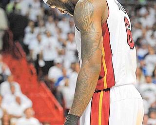 LeBron James of the Heat hangs his head during the third quarter in Game 6 of the NBA Finals between the Miami Heat and the Dallas Mavericks at the AmericanAirlines Arena in Miami, Florida, Sunday, June 12, 2011. (Michael Laughlin/Sun Sentinel/MCT)