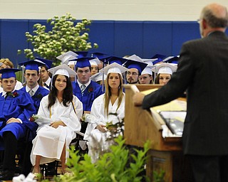 Poland High School seniors listen to the commencement speaker Poland High School teacher William Snyder.