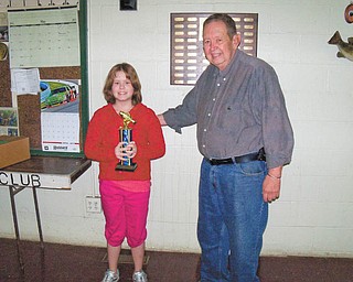 When the Hubbard Conservation Club had its Kids’ Fishing Derby recently, the top winner was Alexandria McFarland, 11. Here, Ed Wolfinger stands with Alexandria after presenting her with the First Place Overall trophy.