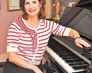 Renee Gessner, Canfield Board of Education member, stood out when she votedagainst fees for band and choir students. As school boards across Ohio raise fees or trim budgets after cuts in state funding, philosophical differences emerge among members.
