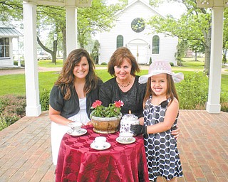 Tea at 2: From 2 to 4 p.m. July 10, Holborn Herb Growers Guild will have its annual Garden Tea Party in the Western Reserve Village at the Canfield Fairgrounds. Guests, who are asked to use the Gate 5 entrance, will be given the opportunity to tour the historical buildings, sample herbal teas and delicacies, listen to garden music and enter a hat contest. There also will be an herb sale and demonstrations. Tickets are limited and are being sold in advance only. Cost is $10 for adults and $5 for children under 10, who are encouraged to take their favorite doll. For tickets call 330-533-3802 or 330-702-0444. Pictured are, from left, Kayla and Shirley Szabo and Katie Koulianos.