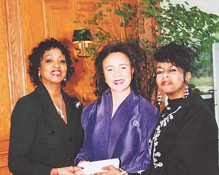 Recently, the Youngstown Chapter of The Links Inc. honored Dr. Glenda Newell-Harris, national vice president from the Alameda Contra-Costa chapter of California. The event took place at the Avalon Golf and Country Club-Squaw Creek in Vienna. Founded in 1946, the Links comprises women who are committed to enriching, sustaining and ensuring the culture and economic survival of black people and others of African ancestry. The national organization has given more than $24 million to charitable causes. From left to right are Links members Marge Staples, Dr. Newell-Harris and Dr. Krishmu Shipmon, chapter president, as the key to the city is presented to the honoree.