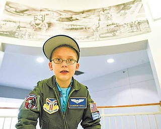 Cameron Shull, 8, a third-grader, was sworn in as an honorary Air Force Reserve 2nd Lieutenant and fitted with a replica of an air crew flight suit as part of the 910th Airlift Wing’s Pilot for a Day program. Cameron is being treated for cerebral palsy at Akron Children’s Hospital Mahoning Valley.