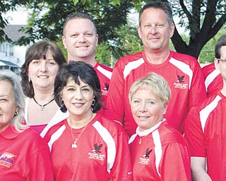 Members of the Canfield Fourth of July Parade Committee for 2011 are, from left to right, Clare Neff; John Craig; Barb Fisher; Renee Benson; Enid Maldonado, general chairwoman; Canfield Police Chief Chuck Colucci; Carol Salmon; David Burch, general chairman; Jeff Molierno; Mark Sabol; and Jack Salmon. Not pictured are Jim Queen and Canfield City Council members Marleen Belfiore and Steve Rogers.