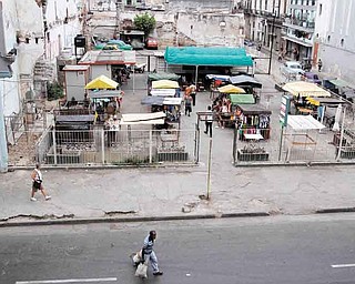 A former parking used as a makeshift market is seen in Havana, Cuba, Friday, June 17, 2011. The application of a group of economic reforms to enhance work independent from the State, forced Cuba's government to transform different spaces in new markets. (AP Photo/Franklin Reyes)